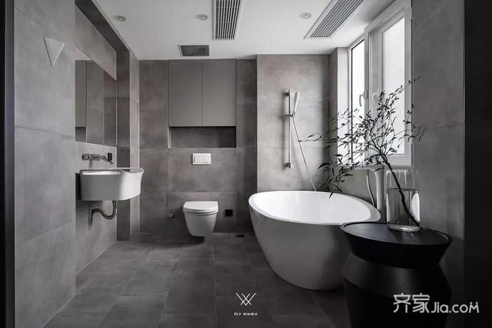 水泥灰色的卫生间,布置上浴缸后,也让卫浴体验更加轻松享受.