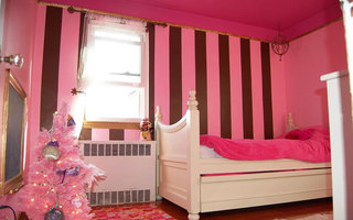 粉色儿童房白色儿童床效果图