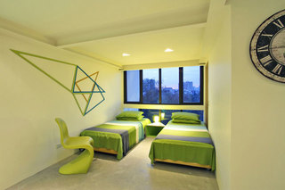 现代简约绿色双人卧室装修效果图
