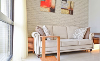 文艺美式客厅 文化砖沙发背景墙设计
