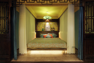 东南亚风格二居室装修卧室背景墙设计图
